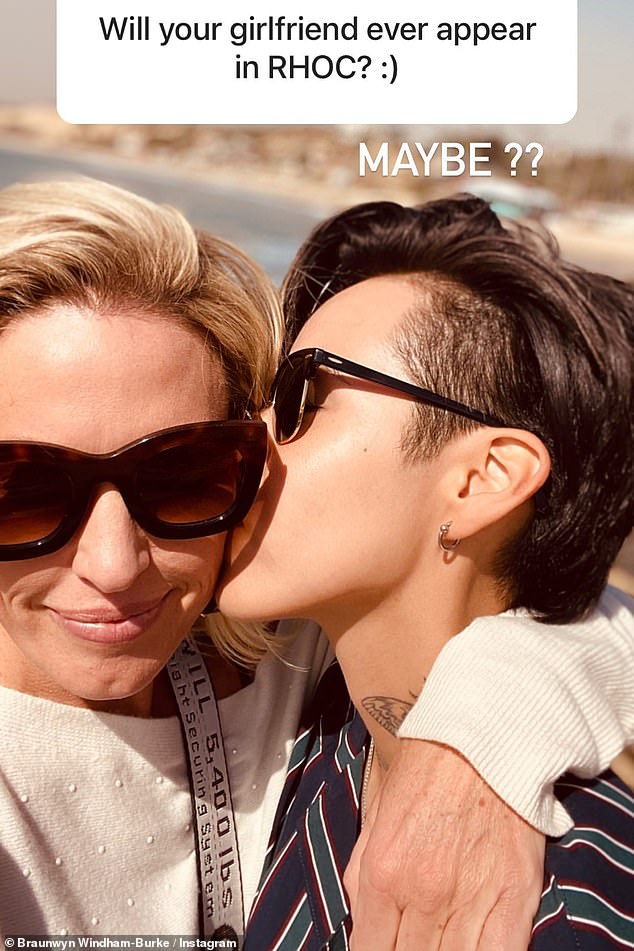 Time will tell: When it comes to whether her friend Chris will ever make an appearance on RHOC, she posted a picture of a young woman kissing her cheek and simply wrote, 